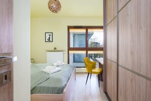 1 habitación, tabla de planchar con plancha, wifi y ropa de cama 