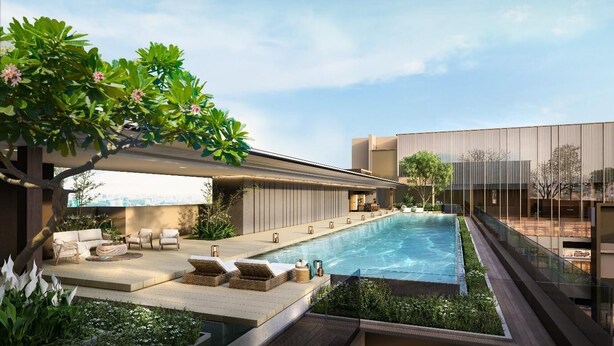 A modern outdoor pool area with lounge chairs, a seating area, and a glass-enclosed building. - The Rixx Skyline Apartment on 21st floor- Netflix, D1, pool, gym, sauna, jacuzzi (Thành phố Hồ Chí Minh)