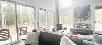 Cozy Cottage on Boardman River. Great location for fishing with a firepit.