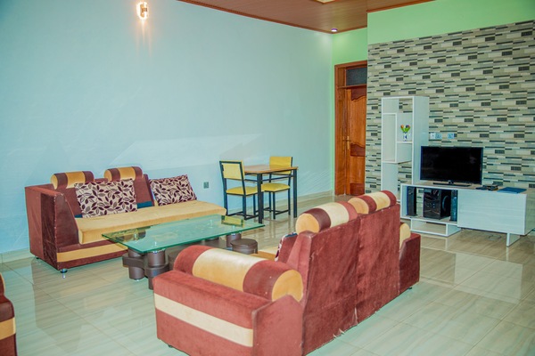 Comfort Double Room | Living area | 64-inch Smart TV with cable channels, TV