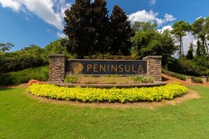 Welcome to Peninsula, surrounded by lush gardens and vibrant flowers.