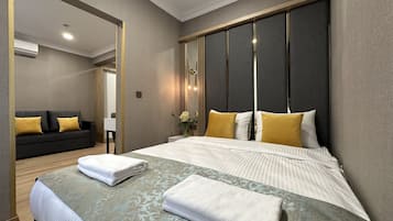 Family Suite with Balcony | In-room safe, desk, laptop workspace, soundproofing