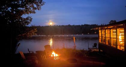 Cozy Adirondack cabin with private dock and kayaks, feet from Adirondack Lake