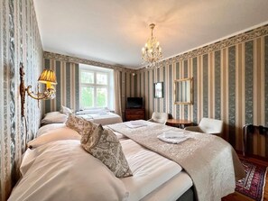 Triple Room | Individually decorated, individually furnished, desk, laptop workspace - Hotel Hospitz (Savonlinna)