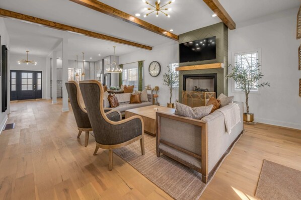 TV, fireplace, books, offices