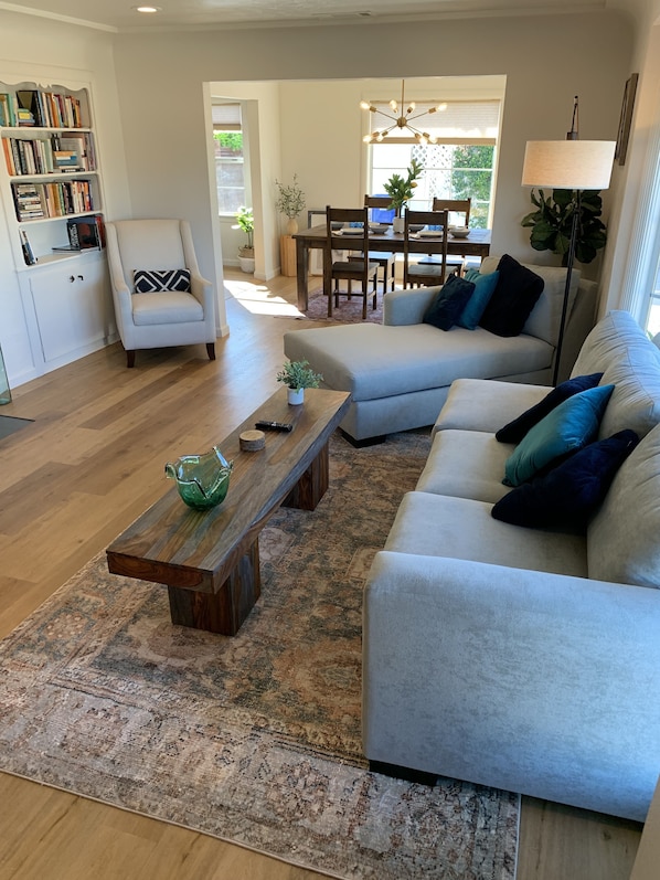 Smart TV, fireplace, books, printers