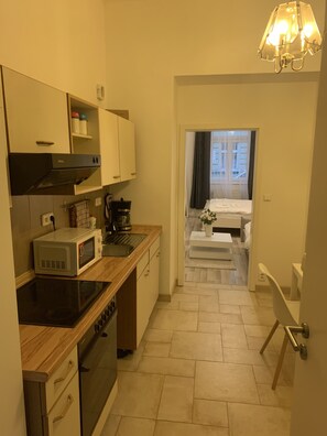 Departamento de diseñador | Cocina privada | Frigobar, microondas, horno y molino para café 
