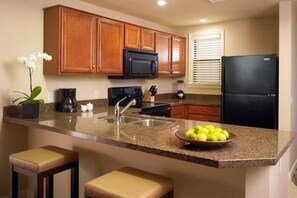 Fridge, microwave, toaster, cookware/dishes/utensils