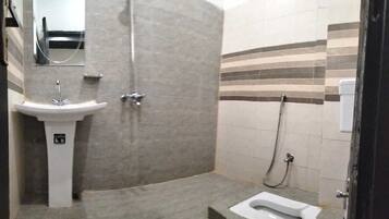 Deluxe Triple Room | Bathroom | Shower, designer toiletries, towels, soap
