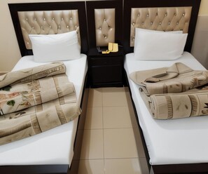 Twin Room | Iron/ironing board, free WiFi, bed sheets - Hotel Sky Inn (Rawalpindi)