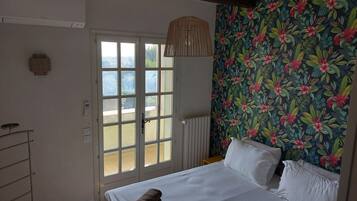 7 quartos, ferros/tábuas de passar roupa, berço de viagem, Wi-Fi