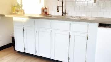 Mini-fridge, microwave, stovetop, coffee/tea maker