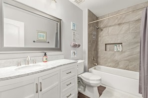 Bathtub, hair dryer, towels