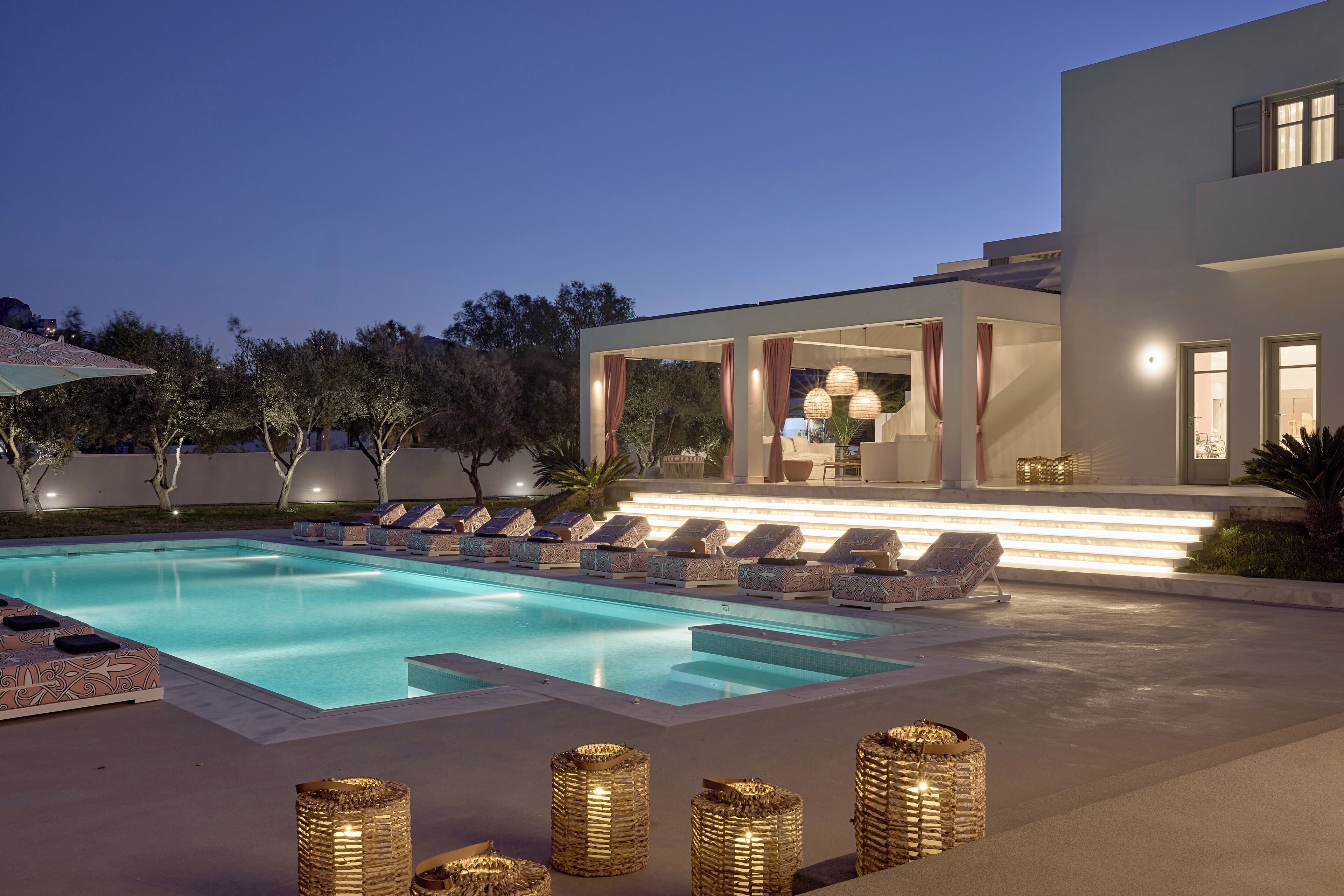 Seasonal outdoor pool, open 9:00 AM to 8:00 PM, pool umbrellas