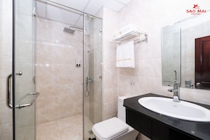Hair dryer, slippers, towels, soap