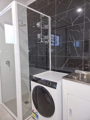 Hair dryer, towels, soap, shampoo