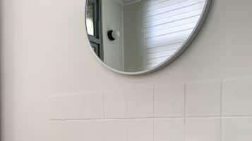 Shower, hair dryer, towels, shampoo