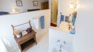The Robert Cameron Room | Bathroom - The Currier Inn (Greeley)