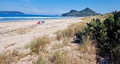 Roberts Beach Escape in Tairua is 3-5 minute walk from the beach