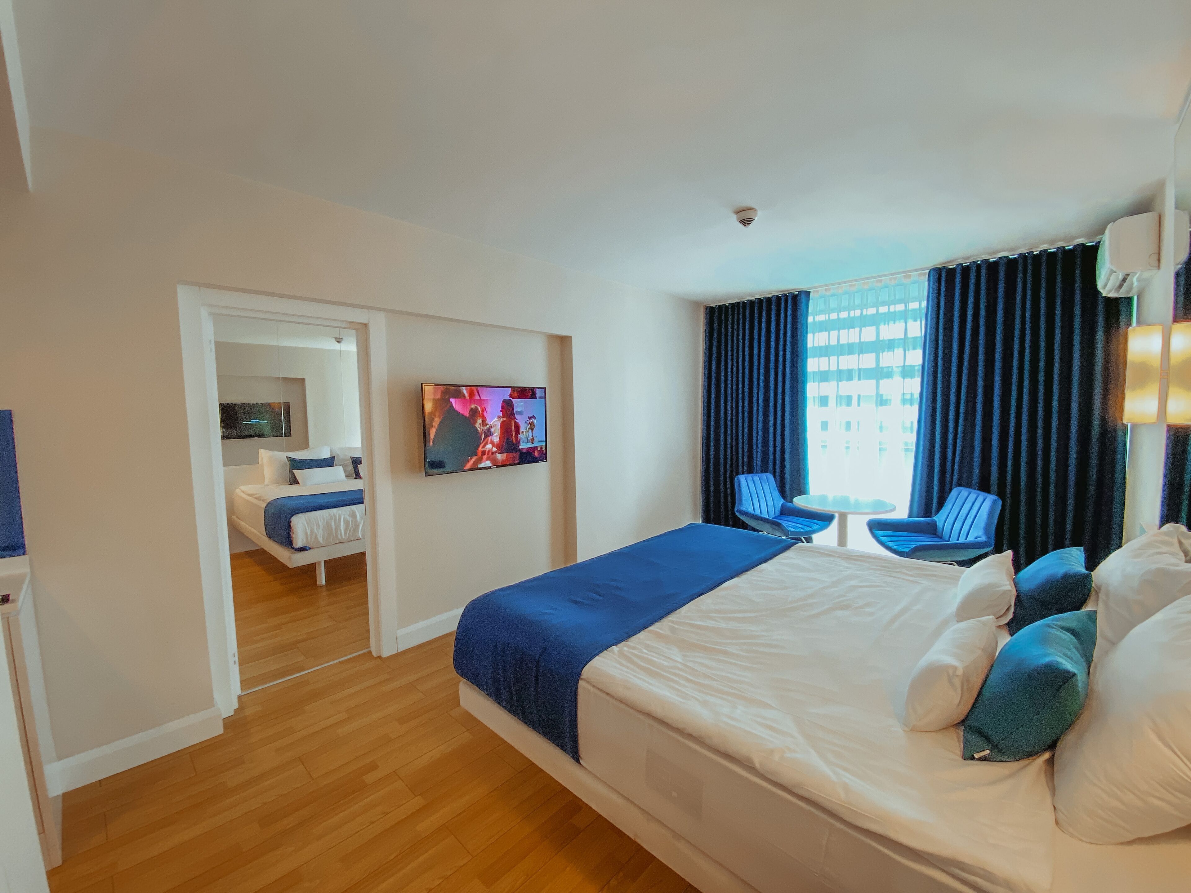 Premium bedding, down comforters, pillowtop beds, minibar