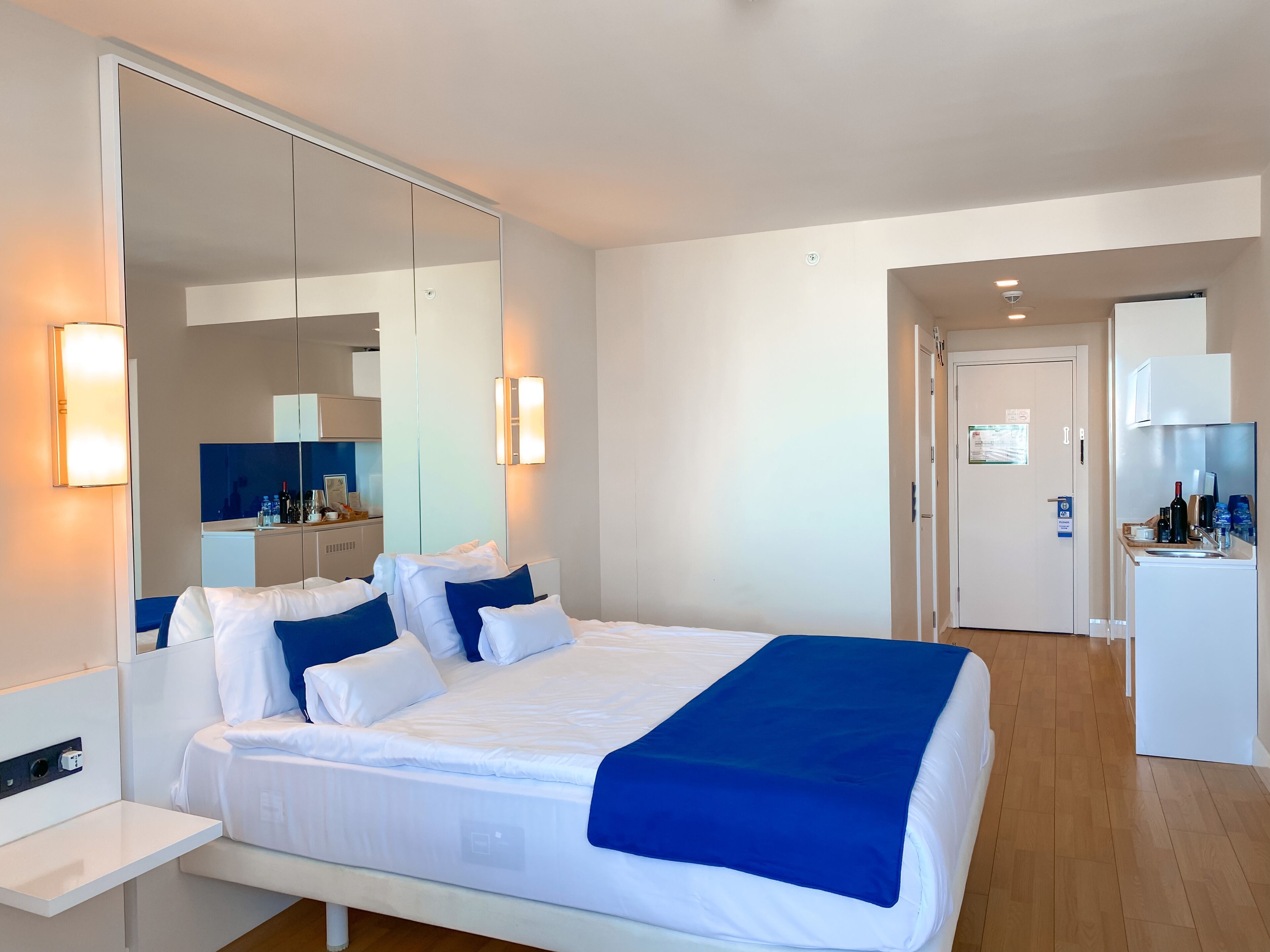 Premium bedding, down comforters, pillowtop beds, minibar