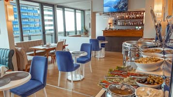 Daily buffet breakfast (USD 30 per person)