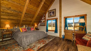 2 habitaciones, escritorio y tabla de planchar con plancha