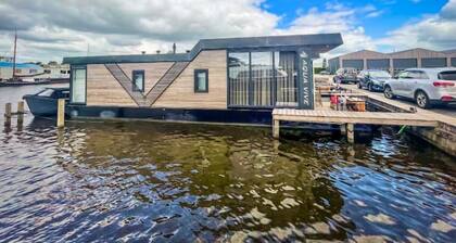 Comfortable, large, moored houseboat