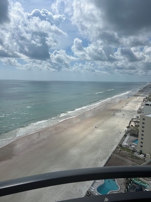 On the beach, sun loungers, beach towels