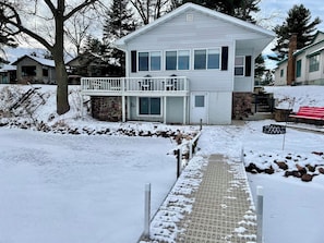 Enjoy the expansive balcony and covered porch of this two-story residence.