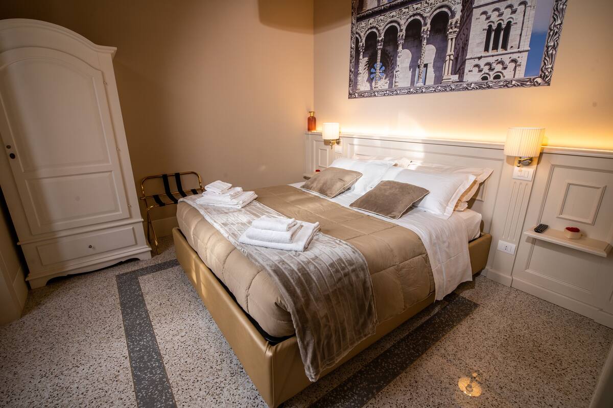 Egyptian cotton sheets, premium bedding, down duvets, memory-foam beds