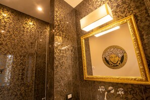 Shower, rainfall showerhead, designer toiletries, hair dryer