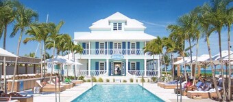 Breathtaking Pool Front 3-Bedroom Condo, Just 8-Min Walk to Pristine Beach!