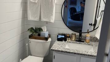 Hair dryer, towels, soap, shampoo