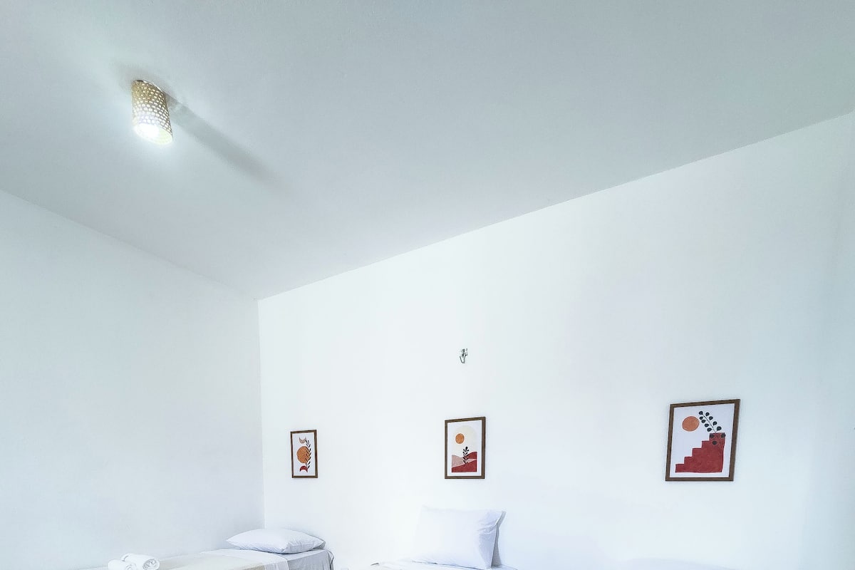 Standard Triple Room, Beach View | Minibar, free WiFi