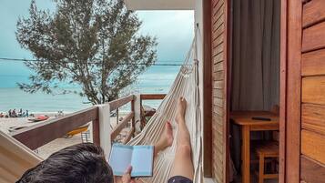 Superior Triple Room, Housekeeping, Beach View | Beach/ocean view