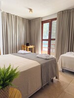 Superior Triple Room, Housekeeping, Beach View | Minibar, free WiFi