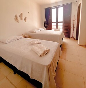 Habitación doble superior, servicio de limpieza, vista a la playa | 1 habitación y wifi gratis