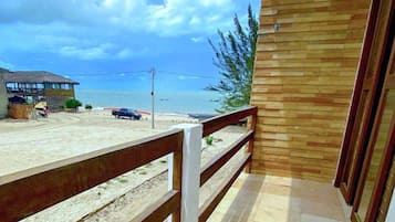 Habitación doble Confort, 1 cama matrimonial, microondas, vista a la playa | Wifi gratis
