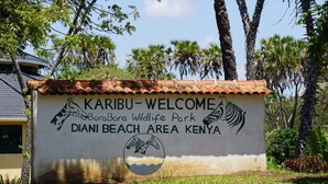 A welcome sign for Bora Bora Wildlife Park in the Diani Beach Area of Kenya.
