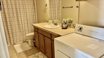 Hair dryer, towels, soap, toilet paper