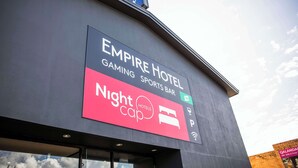 A hotel sign with "EMPIRE HOTEL" and "Nightcap" branding. - Nightcap at Empire Hotel (Kilburn)
