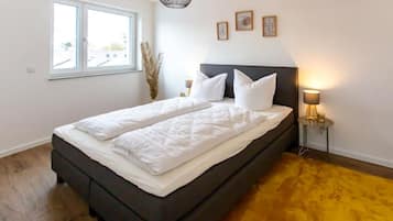 2 室のベッドルーム、旅行用ベビーベッド、WiFi (無料)、ベッドシーツ