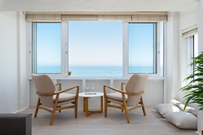 Departamento exclusivo | Área de sala de estar | Televisión de pantalla plana, Netflix y servicios de streaming 