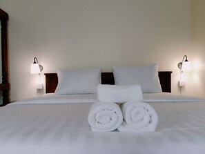Deluxe Double Room, Balcony, Pool View | Laptop workspace, bed sheets - Natural Relax Villa (Siem Reap)