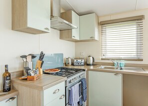 Refrigerador, horno, placa de cocina, tostadora