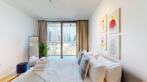 Exclusive Apartment | 1 bedroom, in-room safe, laptop workspace, iron/ironing board - Blvd Point 910 (Dubai)