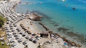 Private beach, free beach shuttle, free beach cabanas, sun loungers