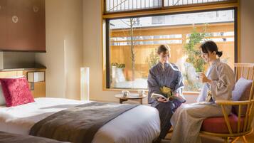 Garden Twin Room, Non Smoking | In-room safe, iron/ironing board, bed sheets