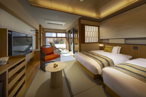 Kahden hengen premier-huone (kaksi sänkyä), tupakointi kielletty | Tallelokero huoneessa, silitysrauta/-lauta, vuodevaatteet